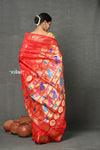 Tyohaar ~ Handloom Pure Silk  Maharani Paithani Saree with Nath Buttis & Handcrafted Peacock Lotus Pallu ~ Red