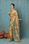 Tyohaar ~ Exquisite Golden Pure Tissue Saree With Sea Blue Border