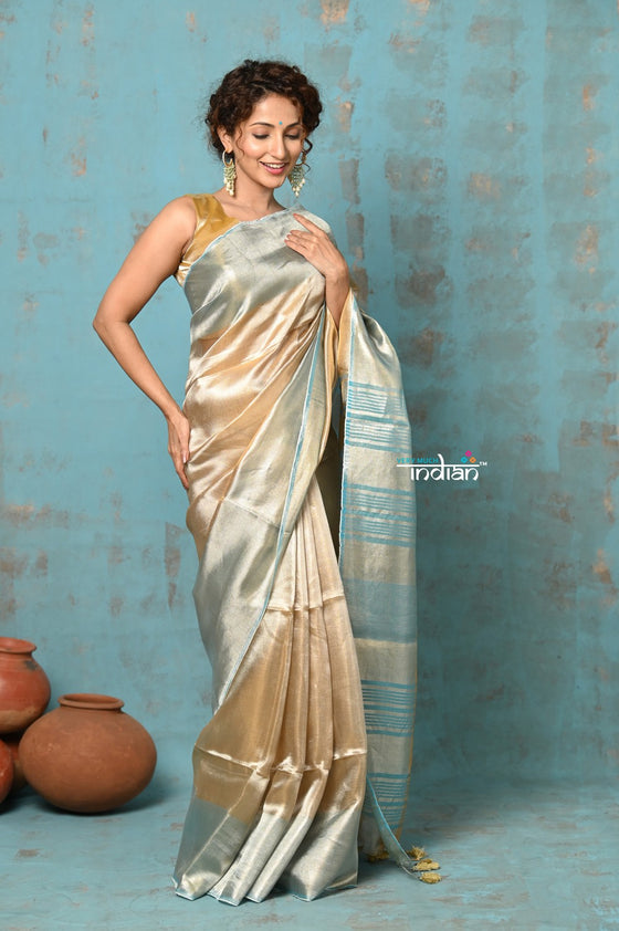 Tyohaar ~ Exquisite Beige Golden Pure Tissue Saree With Sea Blue Border