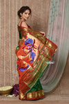 Tyohaar ~ Signature Weave! Handloom Pure Silk Paithani Saree with Handcrafted Peacock Pallu ~ Royal Green