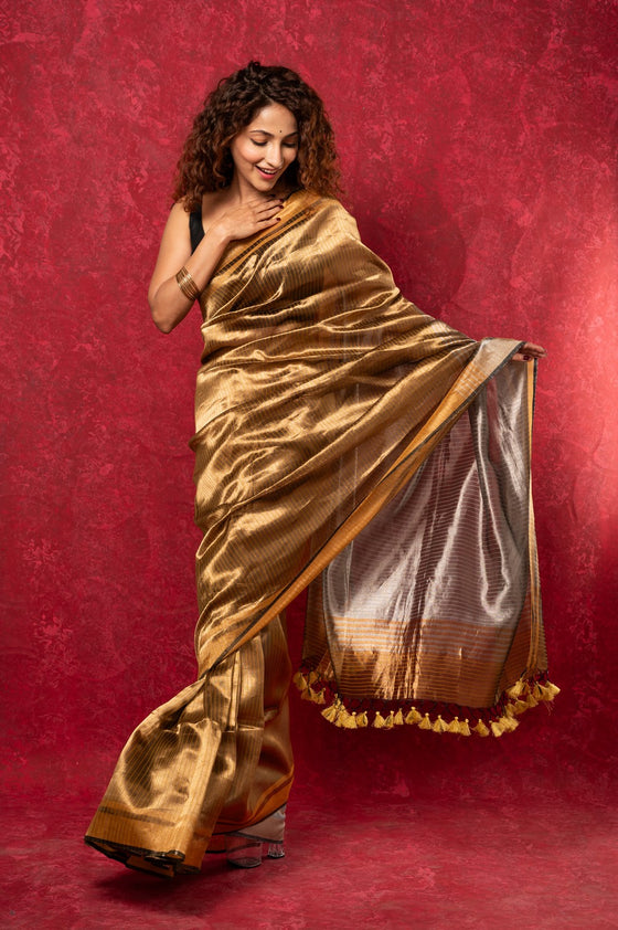 Exquisite Golden Handloom Pure Silk Tissue Saree With Silver Pallu