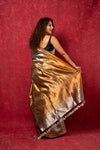 Exquisite Silver Handloom Pure Silk Tissue Saree With Golden Pallu and Tassels