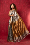 Exquisite Silver Handloom Pure Silk Tissue Saree With Golden Pallu and Tassels