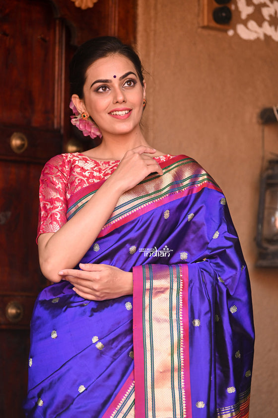 Mayur ~ Authentic Traditional Handloom Pure Silk Paithani in a combination of Royal Blue and Orange.