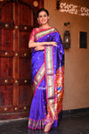 Mayur ~ Authentic Traditional Handloom Pure Silk Paithani in a combination of Royal Blue and Orange.